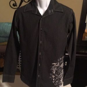 Men small black and white striped long sleeves collar shirt .